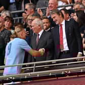 Erling Haaland shakes hands with Sir Jim Ratcliffe