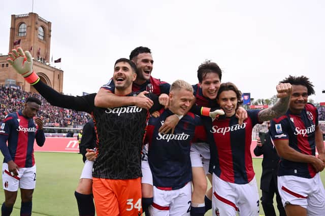 Federico Ravaglia, Charalampos Lykogiannis, Jens Odgaard, Giovanni Fabbian, Riccardo Calafiori and Joshua Zirkzee of Bologna FC celebrate
