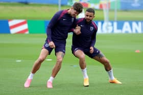 John Stones has called on Manchester City's players to use their winning experiences at club level to inspire England.