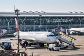 A Juneyao Air plane is seen at the Shanghai Pudong International Airport in Shanghai