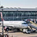 A Juneyao Air plane is seen at the Shanghai Pudong International Airport in Shanghai