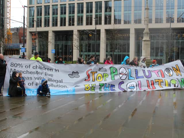 <p>Manchester Friends of the Earth protesting about air pollution levels</p>