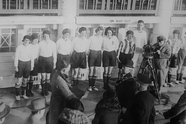 Football celebrities. A Pathe film crew capturing the Dick Kerr Ladies team at a public appearance in Blackpool 1931.  Credit: Lizzy Ashcroft Collection