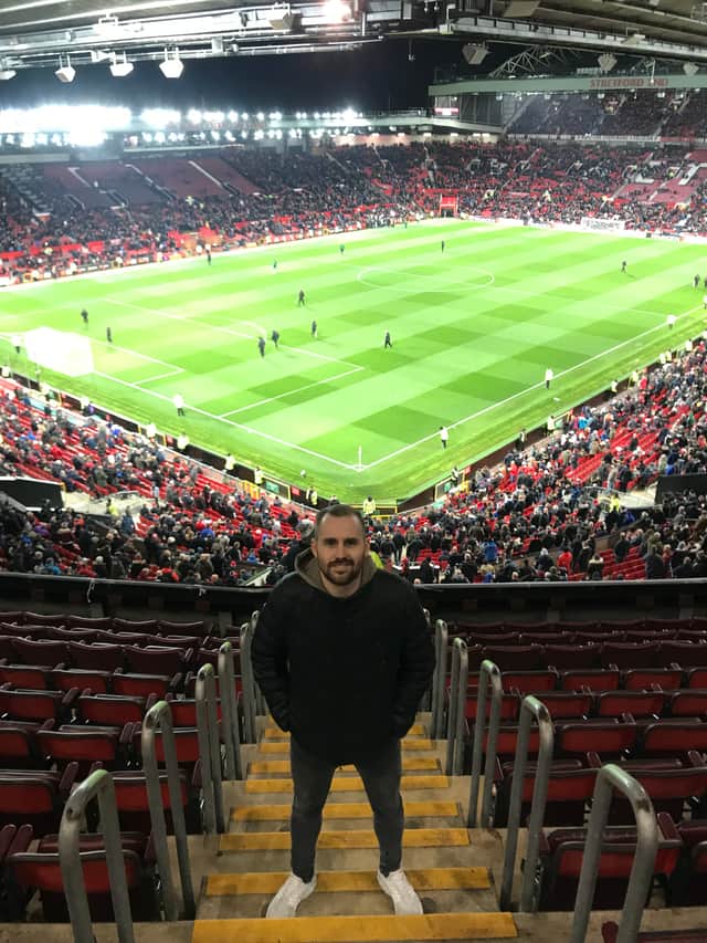 <p>Manchester World reporter Michael Plant pictured at Old Trafford.</p>