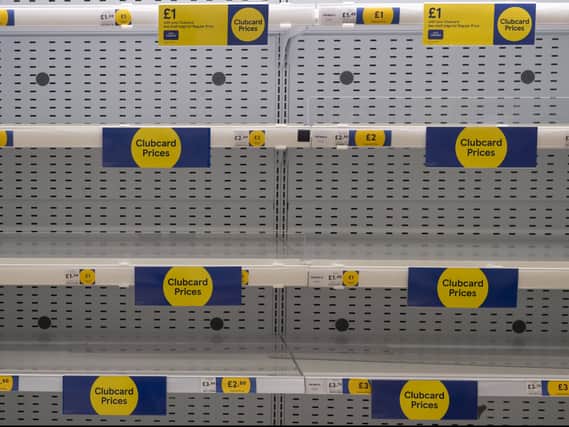 Empty supermarket shelves are seen in a supermarket on July 23, 2021 in London (Photo by Dan Kitwood/Getty Images)