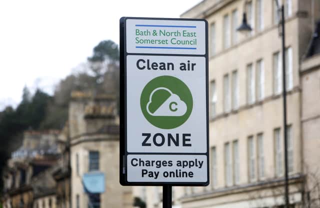A Clean Air Zone sign. (Photo by GEOFF CADDICK/AFP via Getty Images)