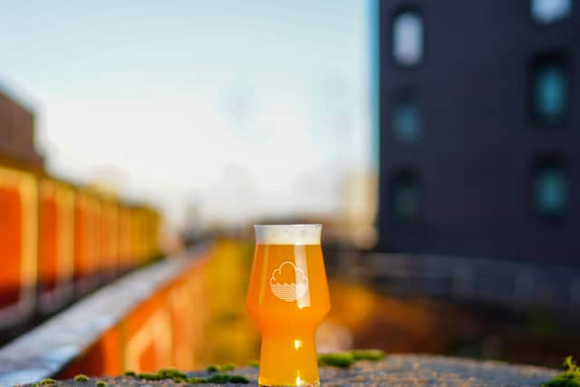 A Cloudwater beer with a Manchester background