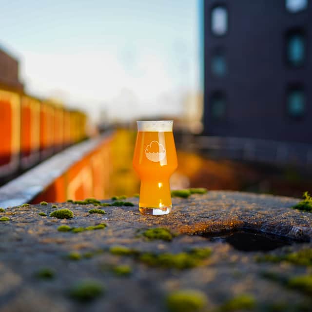 A Cloudwater beer with a Manchester background