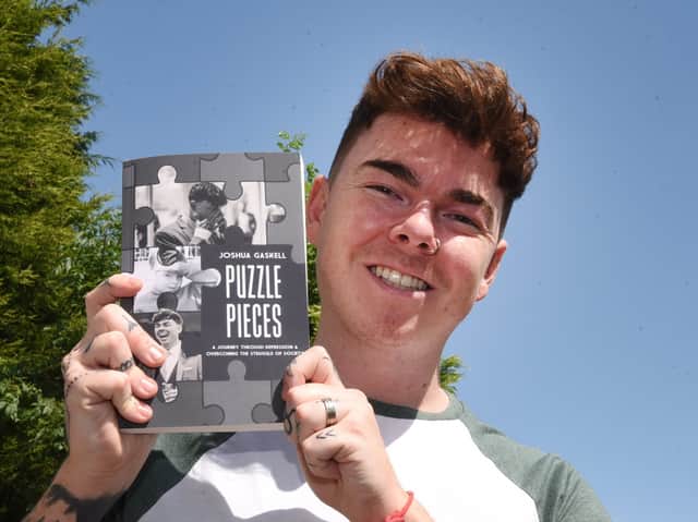<p>Josh Gaskell with his book. Photo: Michelle Adamson/JPIMedia</p>