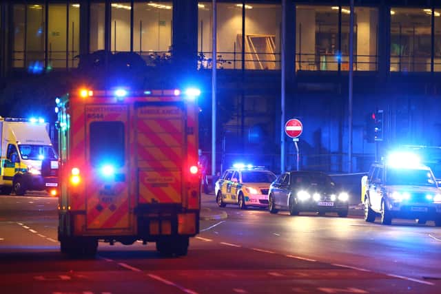 Emergency services arrive  close to the Manchester Arena on May 23, 2017 in Manchester, England.  There have been reports of explosions at Manchester Arena where Ariana Grande had performed this evening.  Greater Manchester Police have confirmed there are fatalities and warned people to stay away from the area. (Photo by Dave Thompson/Getty Images)