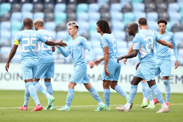 Manchester City players in pre-season action. Credit: Getty.