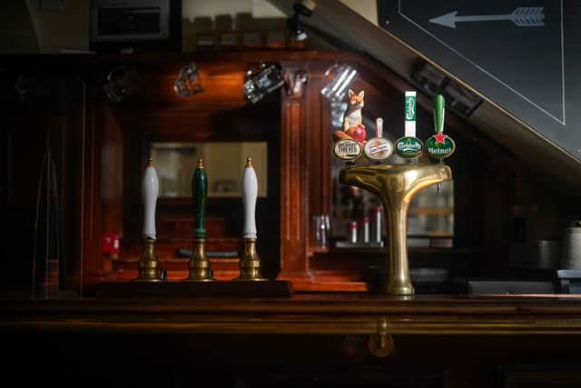 The bar of a pub in Manchester. Photo by Christopher Furlong/Getty Images