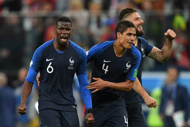 Paul Pogba and Raphael Varane celebrate at the 2018 World Cup. Credit: Getty.