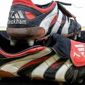 David Beckham’s treble winning boots Credit: SWNS