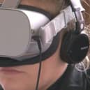 A GM police officer with a VR headset