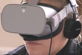A GM police officer with a VR headset
