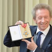 Denis Law with his Commander of the Order of the British Empire (CBE) medal that was presented to him by the Duke of Cambridge during an Investiture ceremony at Buckingham Palace on March 11, 2016 Credit: getty