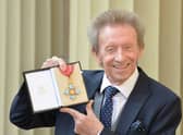 Denis Law with his Commander of the Order of the British Empire (CBE) medal that was presented to him by the Duke of Cambridge during an Investiture ceremony at Buckingham Palace on March 11, 2016 Credit: getty