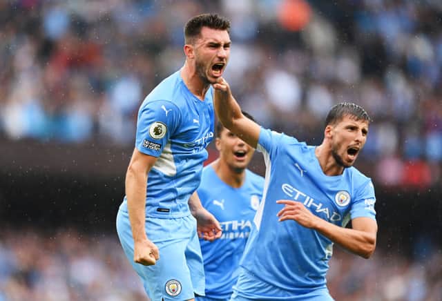 Aymeric Laporte celebrates City’s third against Norwich   Credit: Getty Iimages