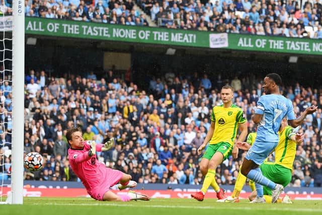 Raheem Sterling slots in City’s fourth at the Etihad  Credit: Getty Images