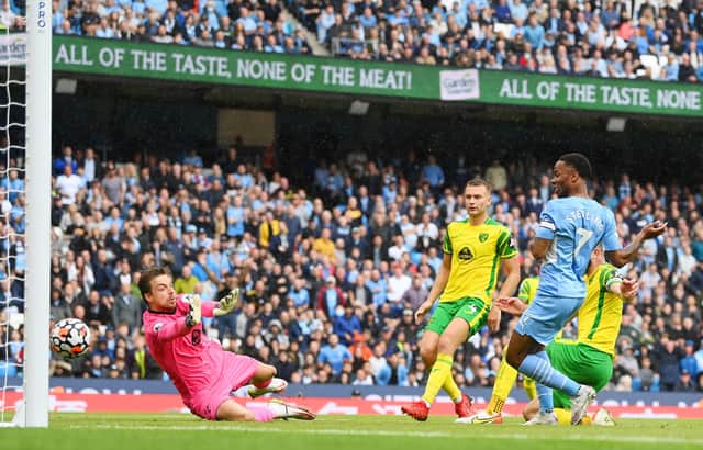 Raheem Sterling slots in City’s fourth at the Etihad  Credit: Getty Images
