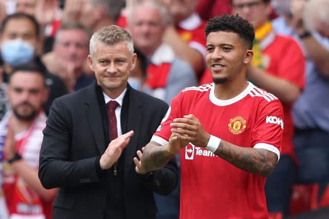 Ole Gunnar Solskjaer and Jadon Sancho. Credit: Getty.