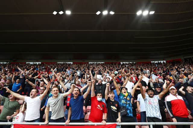 Manchester United fans show their support   Credit: Getty Images