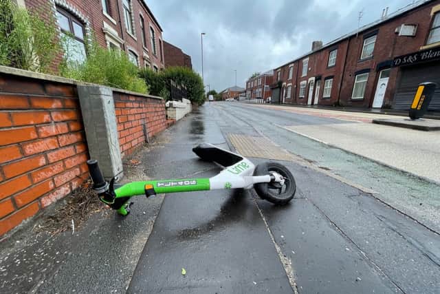 An e-scooter fallen over on the pavement in Rochdale. Photo: National Federation of the Blind of the UK