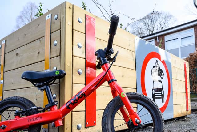 A bike next to a modal filter at Longford Park in Trafford. Photo: Nick Harrison