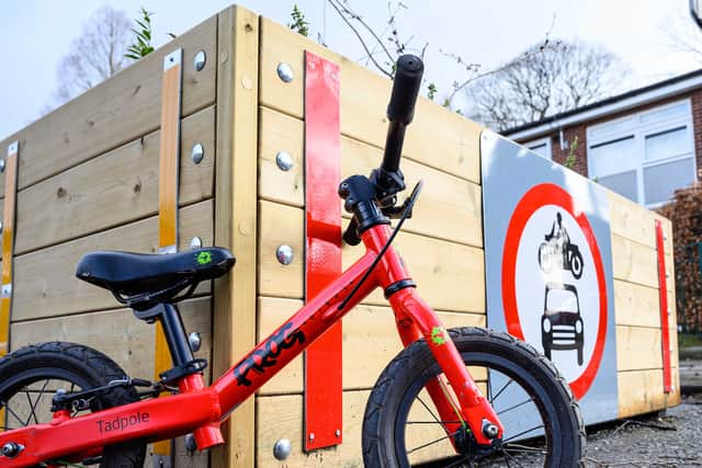 A bike next to a modal filter at Longford Park in Trafford. Photo: Nick Harrison