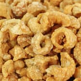 Pork scratchings are a popular snack  Credit: Shutterstock