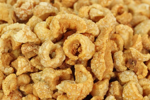 Pork scratchings are a popular snack  Credit: Shutterstock