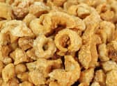 Pork scratchings are a popular snack  Credit: Shutterstock