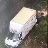 Flytipper caught on camera in April 2020  Credit: Manchester City Council