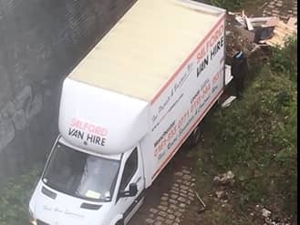 Flytipper caught on camera in April 2020  Credit: Manchester City Council
