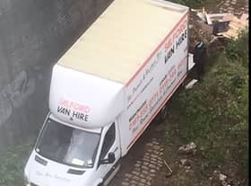 Flytipper caught on camera in April 2020  Credit: Manchester City Council