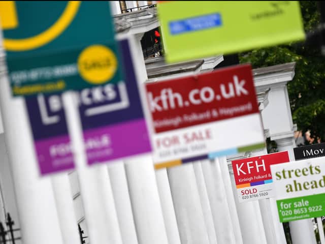 Estate agents’ boards of houses for sale, sold and to let. Photo: Daniel Leal-Olivas/AFP via Getty Images)