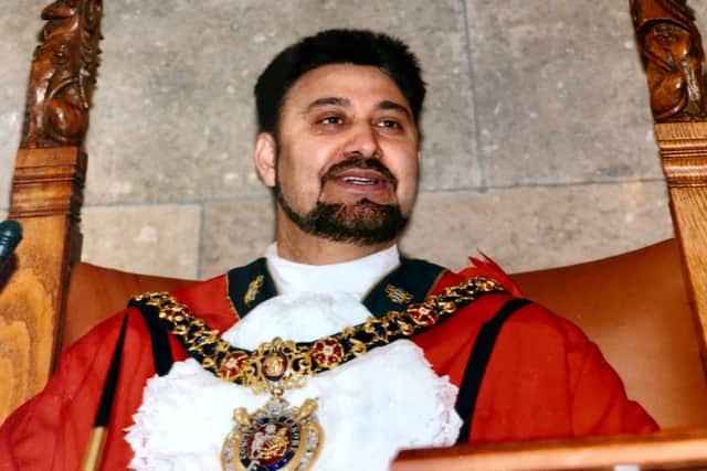 Afzal Khan wearing his mayoral robe and chain