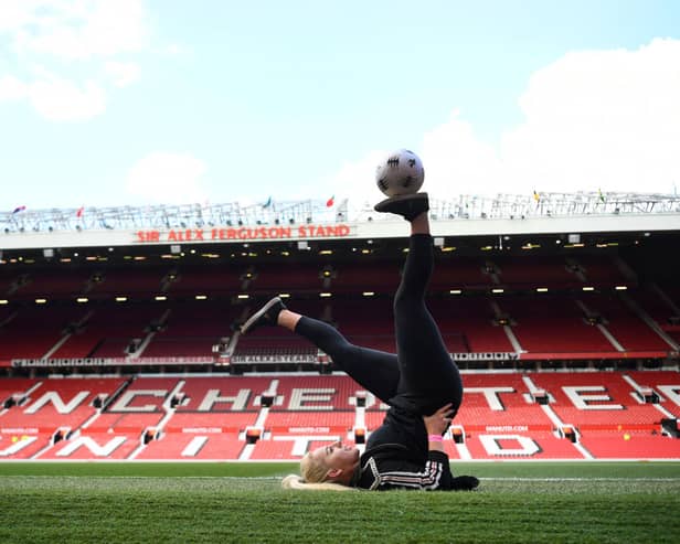 Football freestyler Liv Cooke performs pitch side prior to  a match   Credit: Getty Images