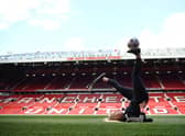 Football freestyler Liv Cooke performs pitch side prior to  a match   Credit: Getty Images