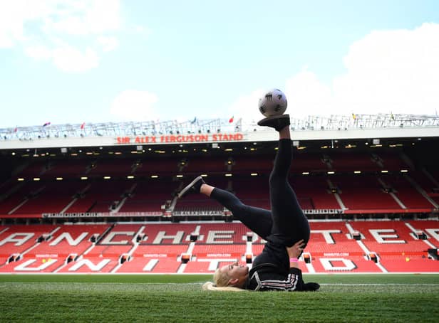 <p>Football freestyler Liv Cooke performs pitch side prior to  a match   Credit: Getty Images</p>