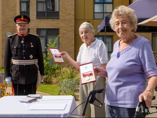 Sonja Sternberg (L) and Gisela Feldman (R) with the Lord Lieutenant of Greater Manchester