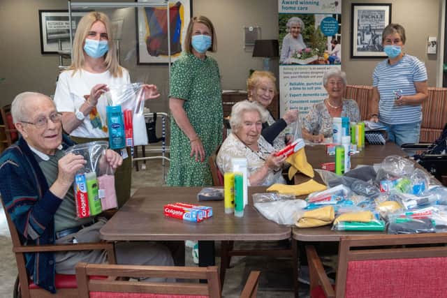 Residents at Belong Morris Feinmann helping Afghan refugees