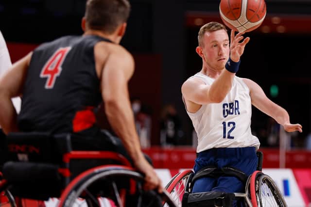 Gregg Warburton playing wheelchair basketball for GB against Canada. Photo by Tasos Katopodis/Getty Images
