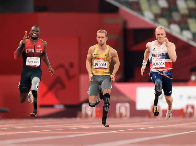 <p>Jonnie Peacock (right) in action in the 100m men’s T64 final at the Paralympic Games. Photo by Carmen Mandato/Getty Images</p>