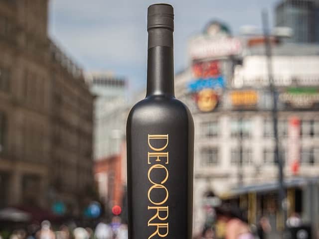 A Decorrum bottle in front of the Printworks in Manchester