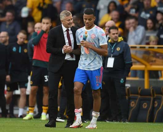 Ole Gunnar Solskjaer and Mason Greenwood. Credit: Getty.