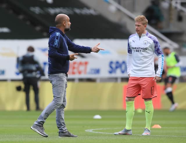 <p>Pep Guardiola and Kevin De Bruyne. Credit: Getty.</p>