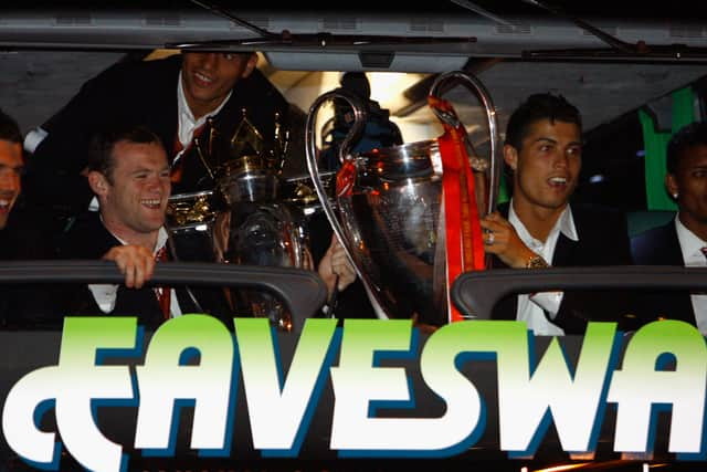 Rooney and Ronaldo with the Champions League trophy. Credit: Getty.