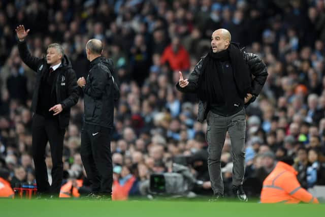 Ole Gunnar Solskjaer and Pep Guardiola. Credit: Getty.